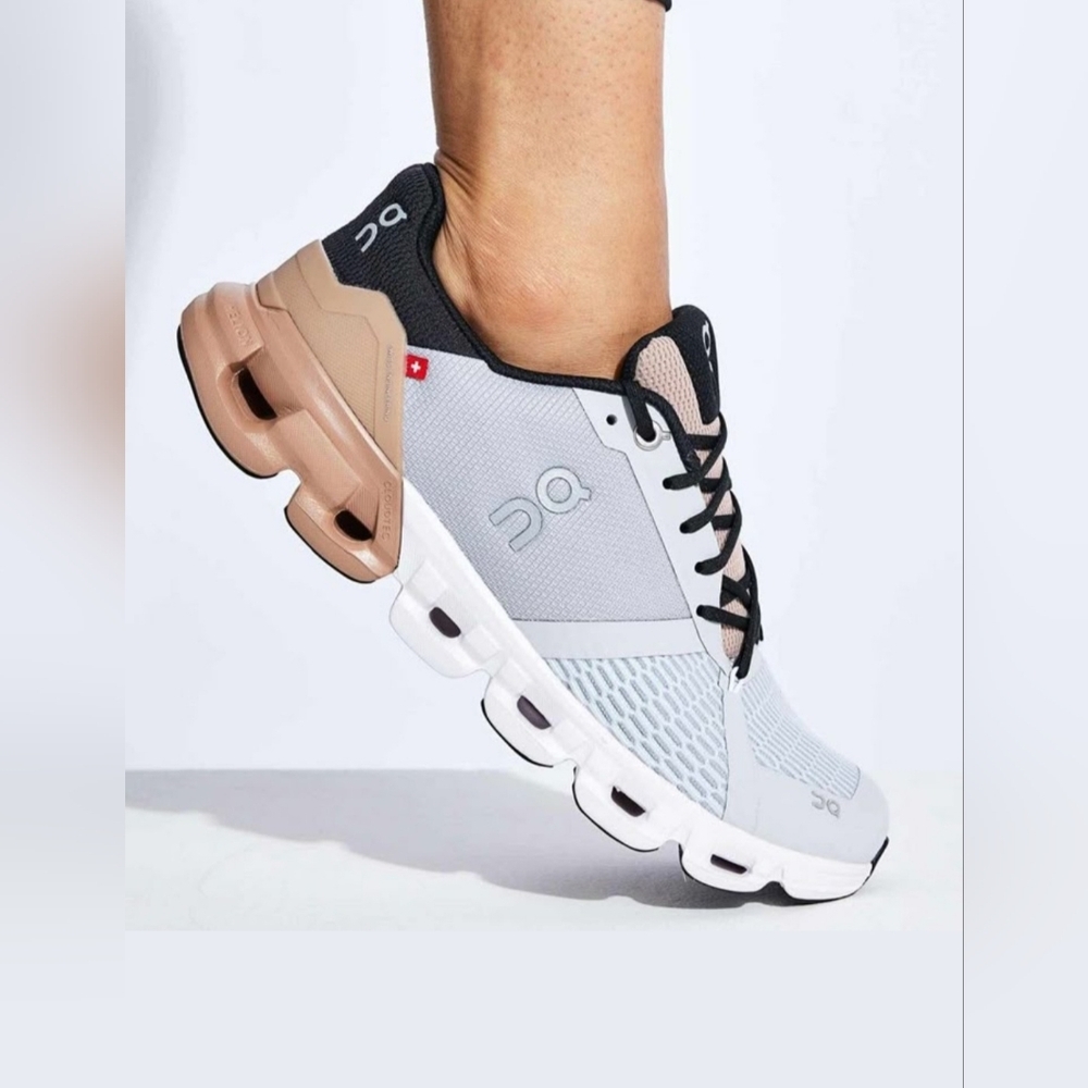On Running Women's Athletic Shoes in White, Black, and Tan